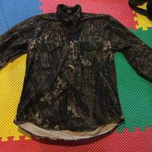 Camouflage button up shirt. Size Large